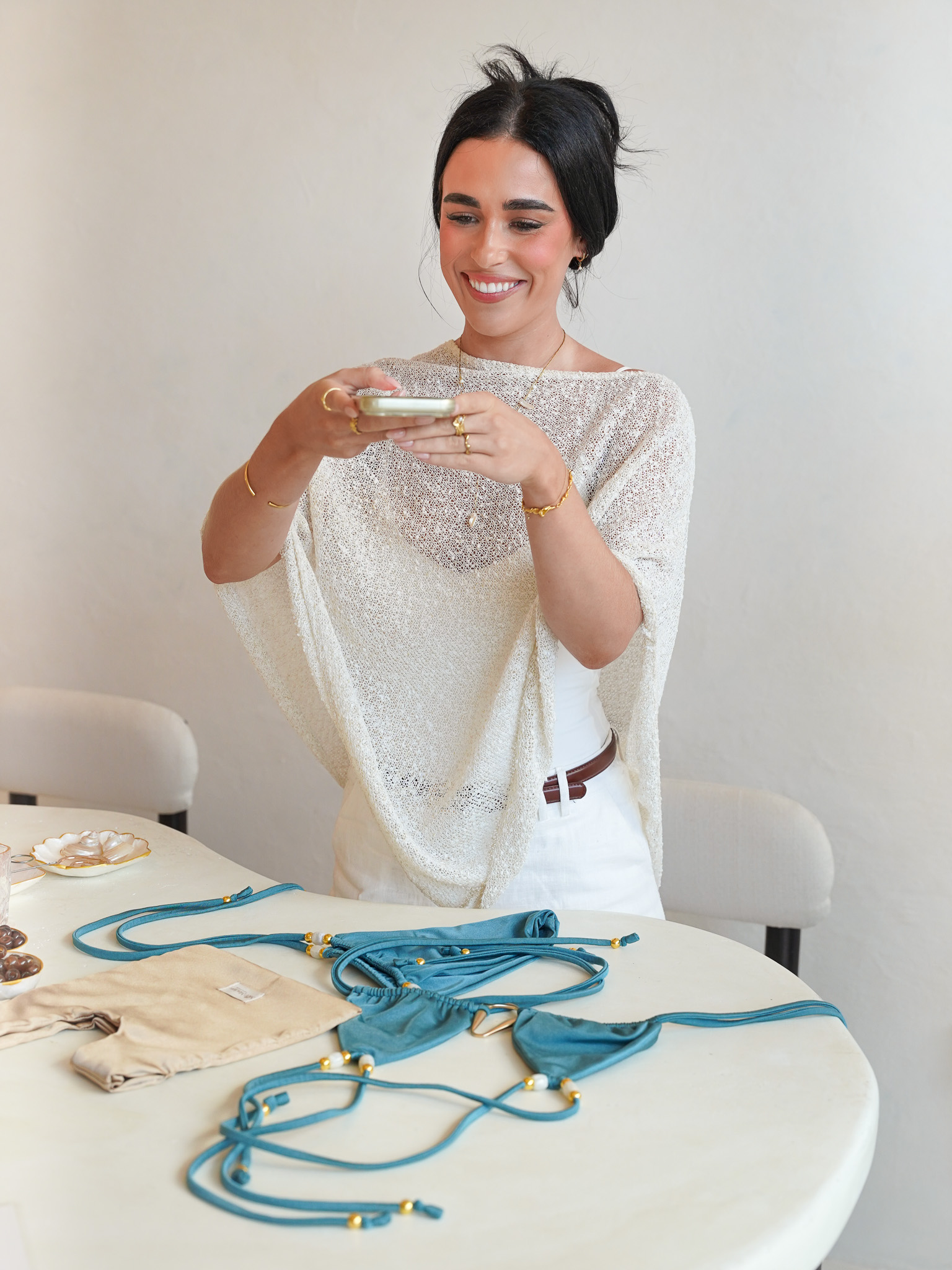 A guest customising her bikini at the Mer.Made atelier table